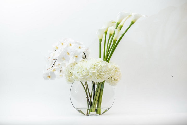 modern lily flower arrangement White Phala, White Calla & White Hydrangea 13" Moon Vase